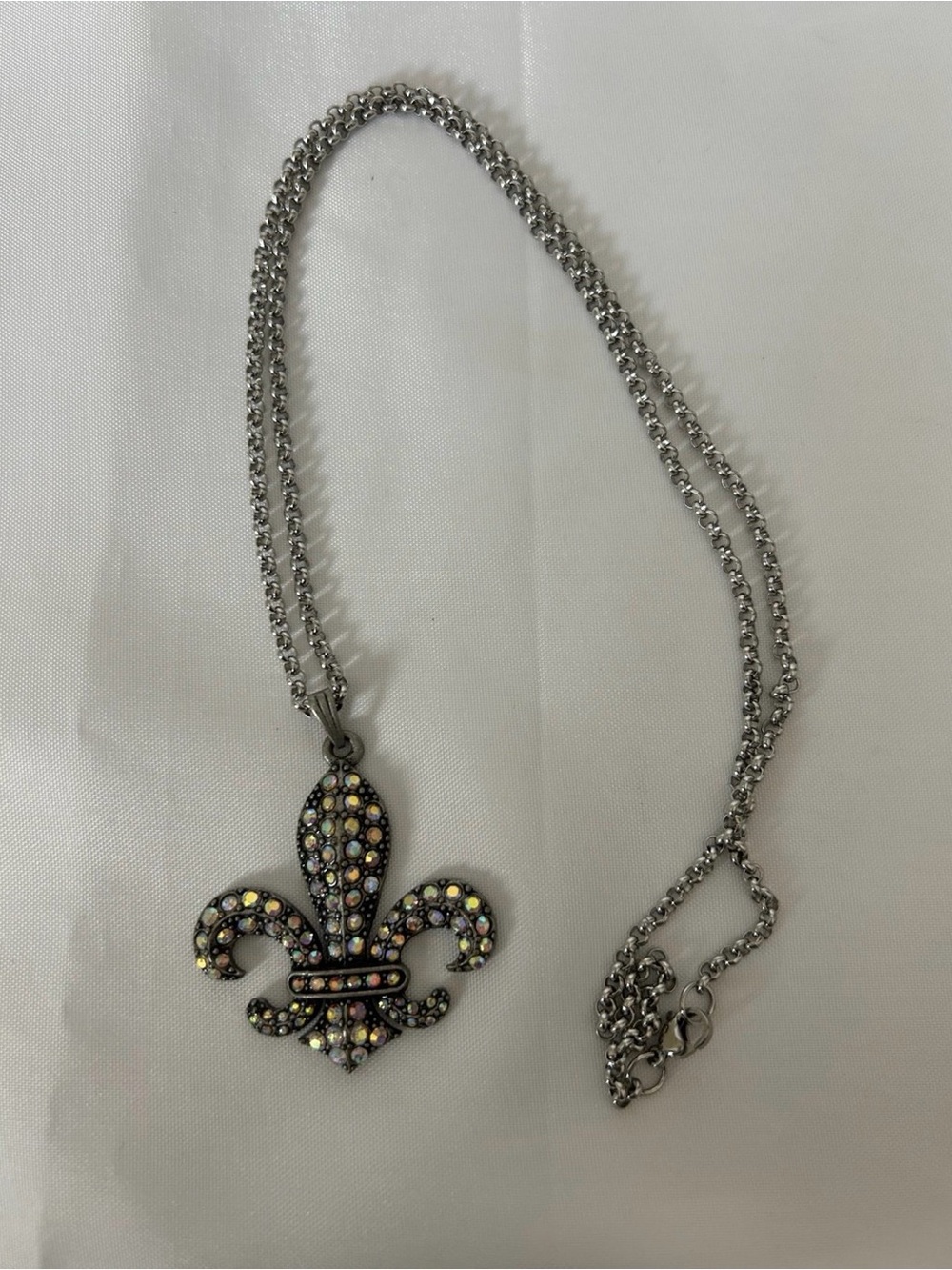 Cute Pewter  Fleur Dis Lis Design Necklace Paved with Aurora Borealis Stones.